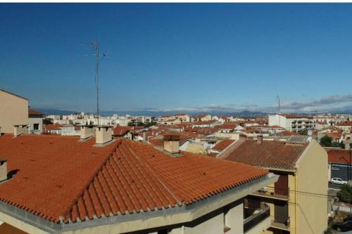 a view of a city with red roofs at Studio terrasse 27m2 RESERVATION SUR RBNB in Perpignan