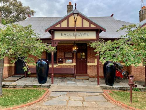 a brick building with a entrance to a library at The Eaglehawk Country House Hotel - Rent your own Hotel in Maldon