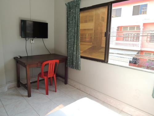 TV o dispositivi per l'intrattenimento presso The Grey Guesthouse