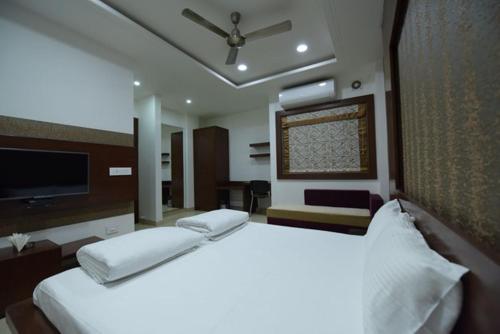 Hotel Alankar Palaceにあるベッド
