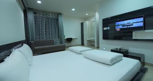 Hotel Alankar Palaceにあるベッド