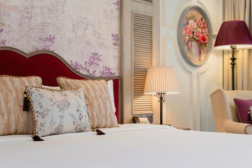 Postel nebo postele na pokoji v ubytování Mercure Dalat Resort