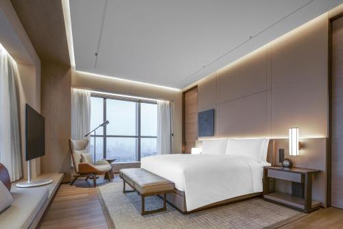 Postel nebo postele na pokoji v ubytování JW Marriott Hotel Changsha