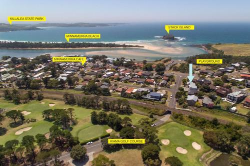 an overhead view of a suburb with houses and the ocean at Minnamurra Beach Bliss Minnamurra in Minnamurra