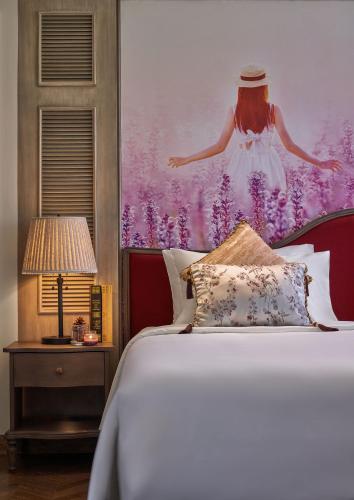 Postel nebo postele na pokoji v ubytování Mercure Dalat Resort