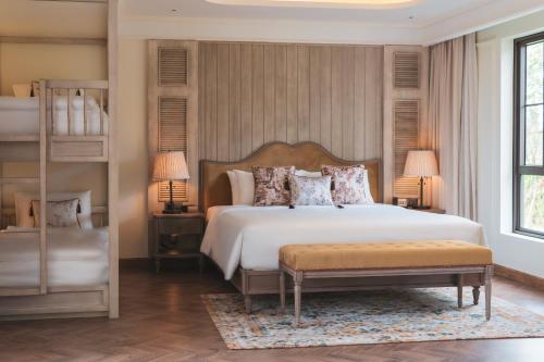 Postel nebo postele na pokoji v ubytování Mercure Dalat Resort