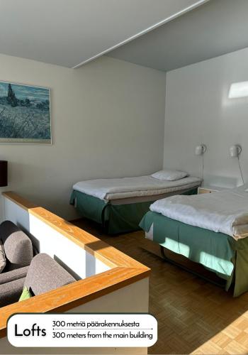 Ένα ή περισσότερα κρεβάτια σε δωμάτιο στο Ikaalinen SPA & Resort