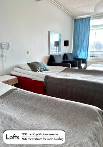Ένα ή περισσότερα κρεβάτια σε δωμάτιο στο Ikaalinen SPA & Resort