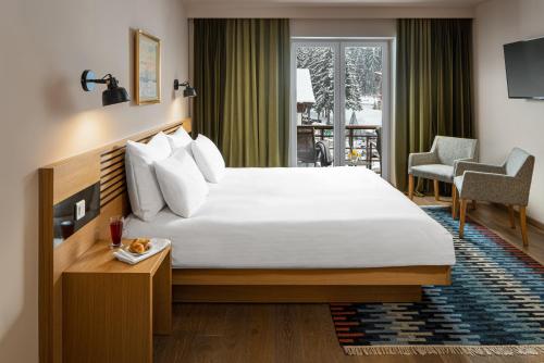 Letto o letti in una camera di Ana Hotels Sport Poiana Brasov