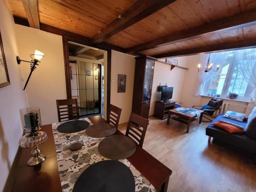 Posedenie v ubytovaní Apartament nad Parsętą w centrum - prywatne miejsce postojowe & dwa rowery