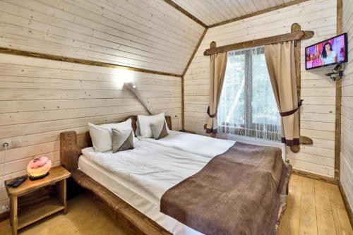 Cama o camas de una habitación en Osonnya Karpaty 4*