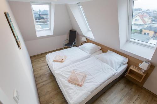Кровать или кровати в номере Sunnevelt-Apartment-17