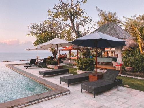 Bassein majutusasutuses Uluwatu Cottages või selle lähedal