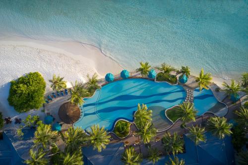 an aerial view of a resort on the beach at Royal Island Resort at Baa Atoll Biosphere Reserve in Baa Atoll