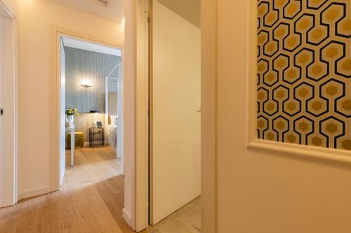 a hallway with a door leading to a room at Navona 49 Luxury Suites&Apartment in Rome