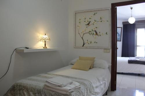 Ένα ή περισσότερα κρεβάτια σε δωμάτιο στο Casa Andrés