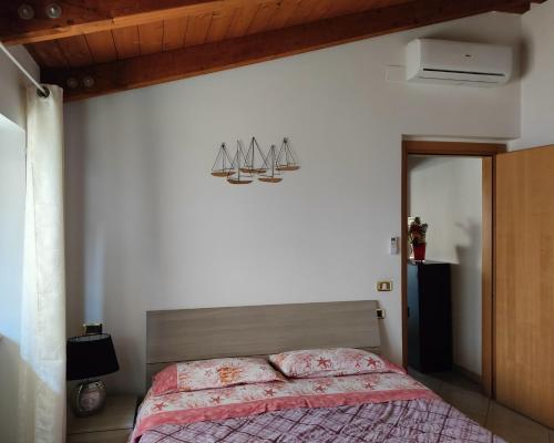 Letto o letti in una camera di Da Cate - Appartamento al mare