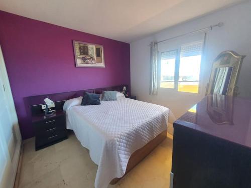 Una cama o camas en una habitación de Apartamento 2 habitaciones en Benalmádena