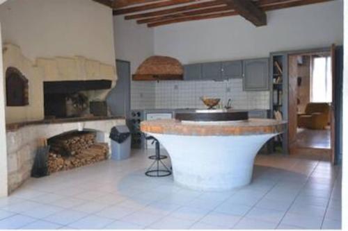 Kuchyň nebo kuchyňský kout v ubytování Le grenier d'Élodie