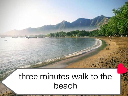 a beach with three minutes walk to the beach at Putu Guest House Pemuteran in Pemuteran