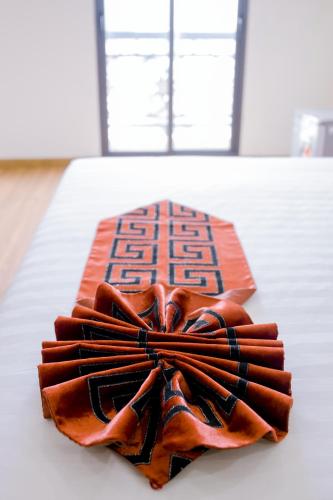 a box with a bow on top of a table at Anh Thảo Hotel Quy Nhơn in Quy Nhon