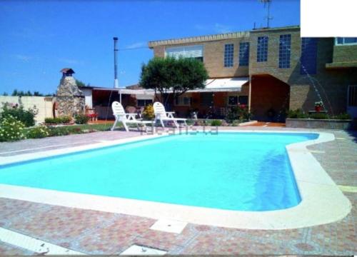Gallery image of Habitaciones en planta superior independiente con piscina - barbacoa in El Batán