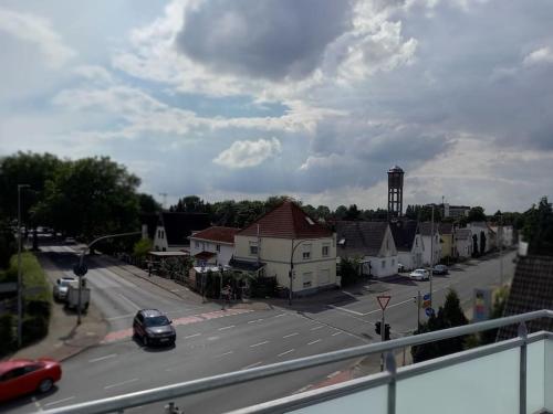 a view of a street with a town with a water tower at Große Moderne Penthouse Wohnung Mit Dachterrasse in Uetersen