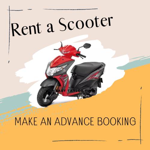 a scooter parked on the beach with the words rent a scooter make at Ayubowan Holiday Home in Kandy