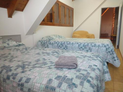 Postel nebo postele na pokoji v ubytování Cálido y confortable Chalet a metros Mendoza Plaza Shopping