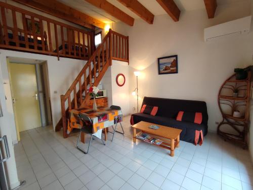 Posedenie v ubytovaní ONDINES I Très joli T2 mezzanine climatisé Richelieu Cap d'Agde