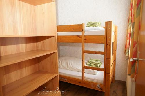 a bunk bed room with two bunk beds at Haus-Koenigsduene-I-3 in Borkum
