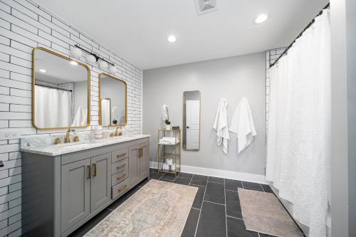 a bathroom with a sink and a mirror at Richmond No. 267 in Richmond