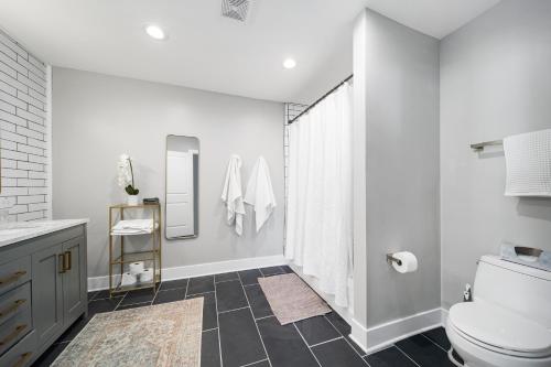 a bathroom with a toilet and a shower at Richmond No. 267 in Richmond