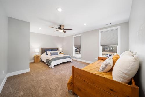 a bedroom with a bed and a ceiling fan at Richmond No. 267 in Richmond