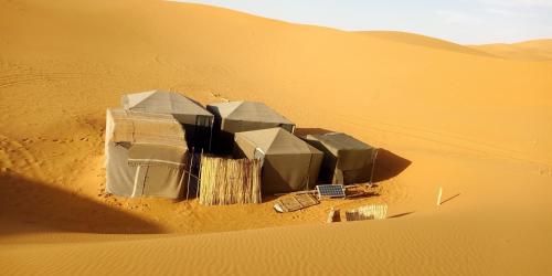 an object in the sand in the desert at Sahara camel tours camp in Merzouga