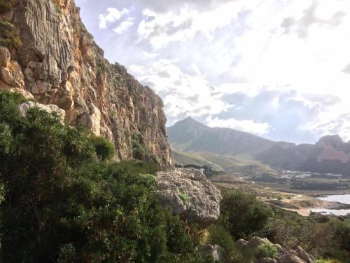 a rocky mountain with a view of a valley at B&B Pietre Preziose in Castelluzzo