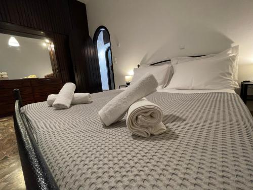 Кровать или кровати в номере Fyrogenis Cozy Family Friendly House in Gournes
