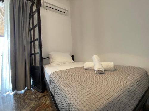 Кровать или кровати в номере Fyrogenis Cozy Family Friendly House in Gournes