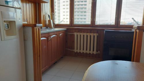 Kuchyň nebo kuchyňský kout v ubytování Rent Apartment Negruzzi Street