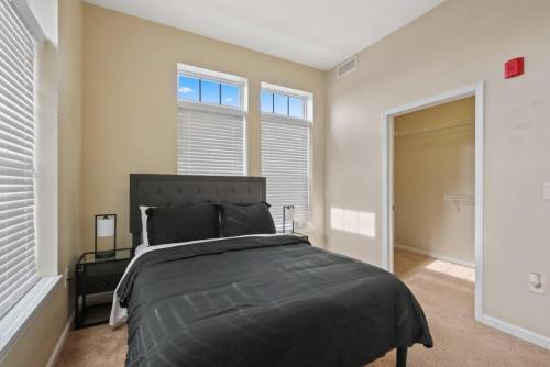 Ένα ή περισσότερα κρεβάτια σε δωμάτιο στο Private Bed Downtown INDY - Shared