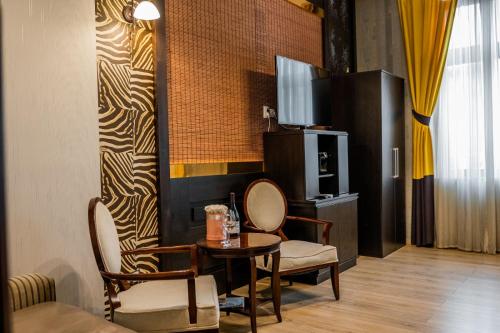 Μια τηλεόραση ή/και κέντρο ψυχαγωγίας στο Apartamente La Teatru Safari