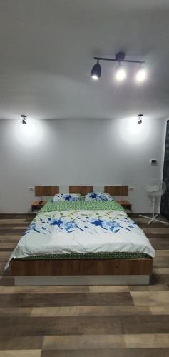 Ένα ή περισσότερα κρεβάτια σε δωμάτιο στο ApartHotel Dominic Residence
