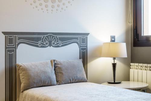 Katil atau katil-katil dalam bilik di Apartahotel Comforsuite
