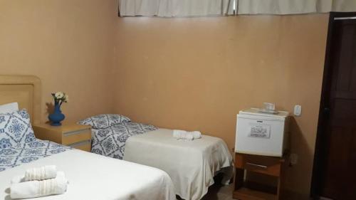 Katil atau katil-katil dalam bilik di Hotel Fazenda Terra Ramos