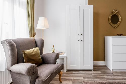 Гостиная зона в Dilo Apartments Berlin - Akazien Residenz Apartments - große Ferienwohnungen für Gruppen