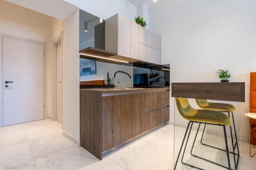a kitchen with a sink and a counter at Apartments & Rooms Grašo in Split