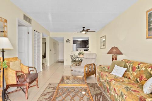 a living room with a couch and chairs at Unit 2105 - Ocean & Racquet Resort in Saint Augustine Beach