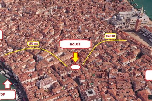 a map of a city with houses and a yellow arrow at The Most Central In Venice [ San Marco Rialto ] in Venice