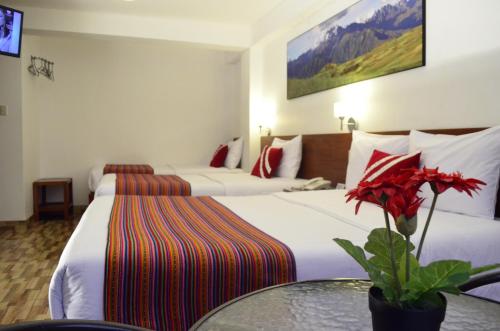 Katil atau katil-katil dalam bilik di Viandina Machupicchu