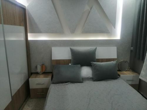 Postel nebo postele na pokoji v ubytování Hassan Rabat